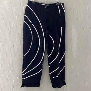 Jamie Sadock size 4 golf pants.  Black with white design.  In like new condition